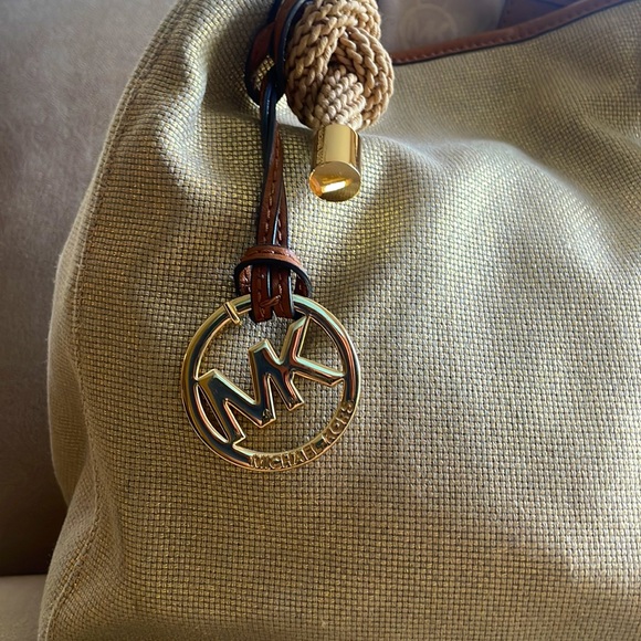 Gently used Gold canvas Michaels Kors bag. - Picture 3 of 6